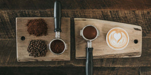 latte art with coffee beans and ground coffee